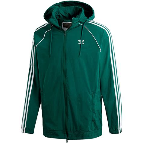 adidas sportjacke grün weiß windbreaker|Adidas green windbreaker.